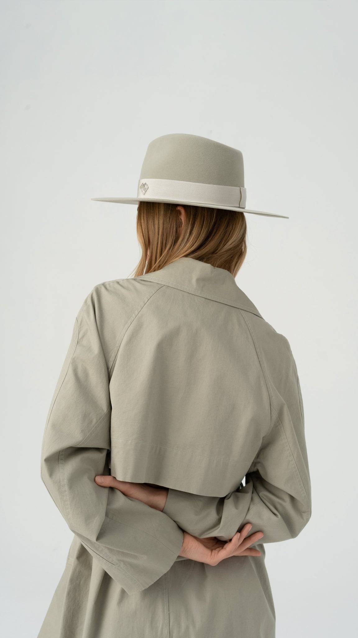 Back view of the Monogram-embellished fedora hat, showcasing the structured design, grey ribbon detail, and Borisetti Heart Monogram accent.