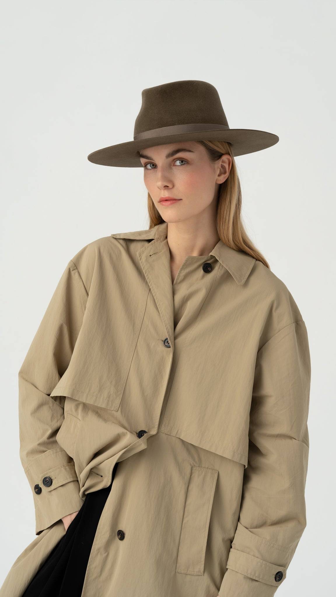 Luxury brown fedora hat with a suede finish, crafted from 100% rabbit fur felt. A stylish accessory perfect for everyday wear and versatile fashion.