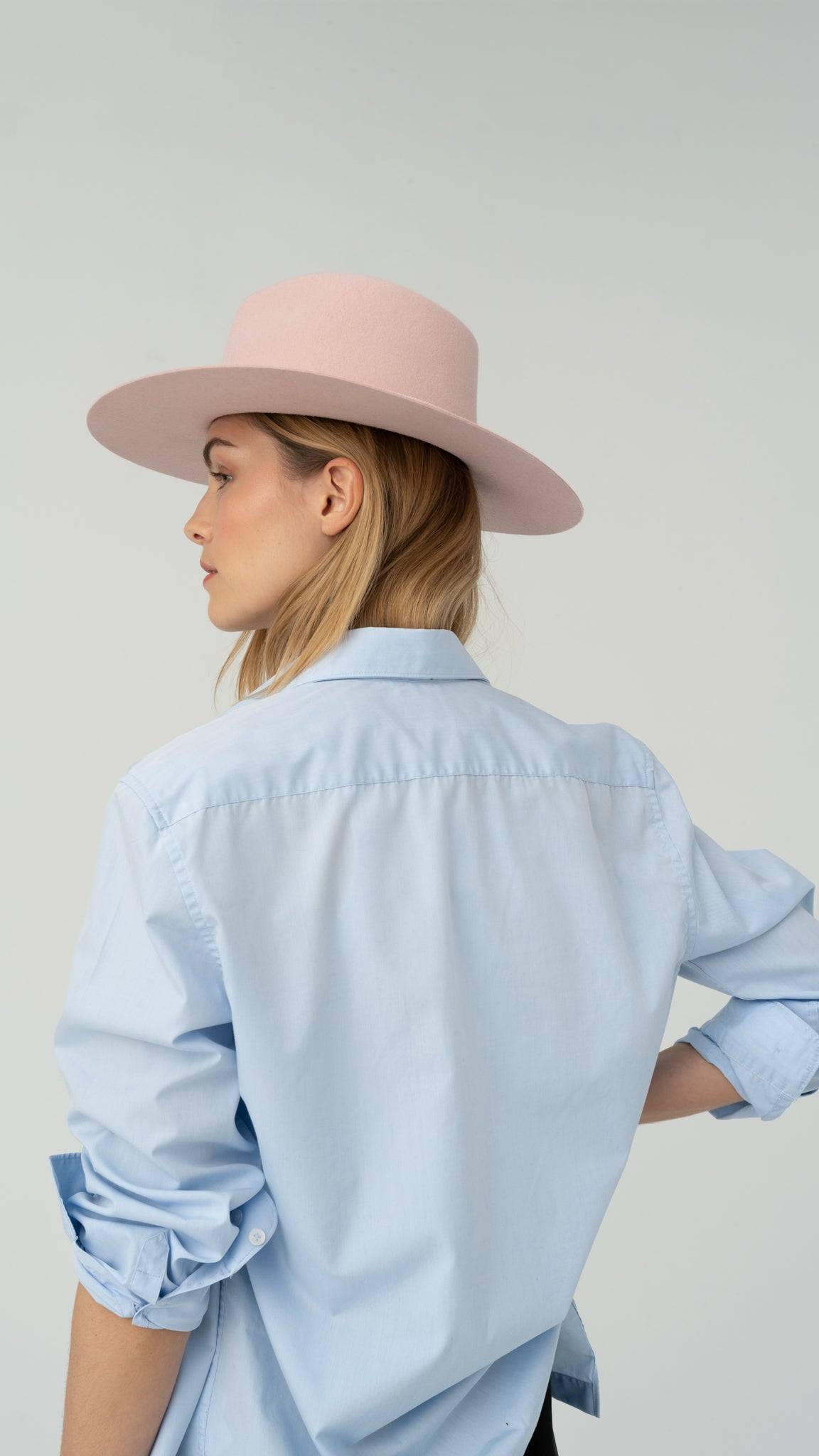 Light pink Monogram fedora hat with a structured design, crafted from premium rabbit fur. Elevate your wardrobe with this sophisticated piece.