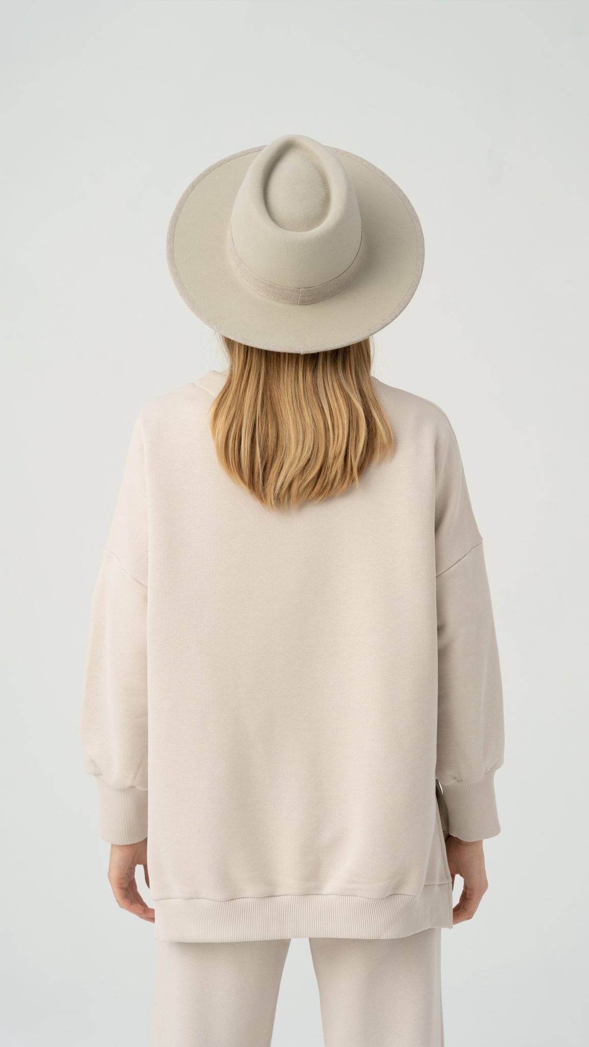 Back view of the Silver Belly Fedora Hat showcasing its structured design and premium craftsmanship. A timeless addition to any wardrobe.