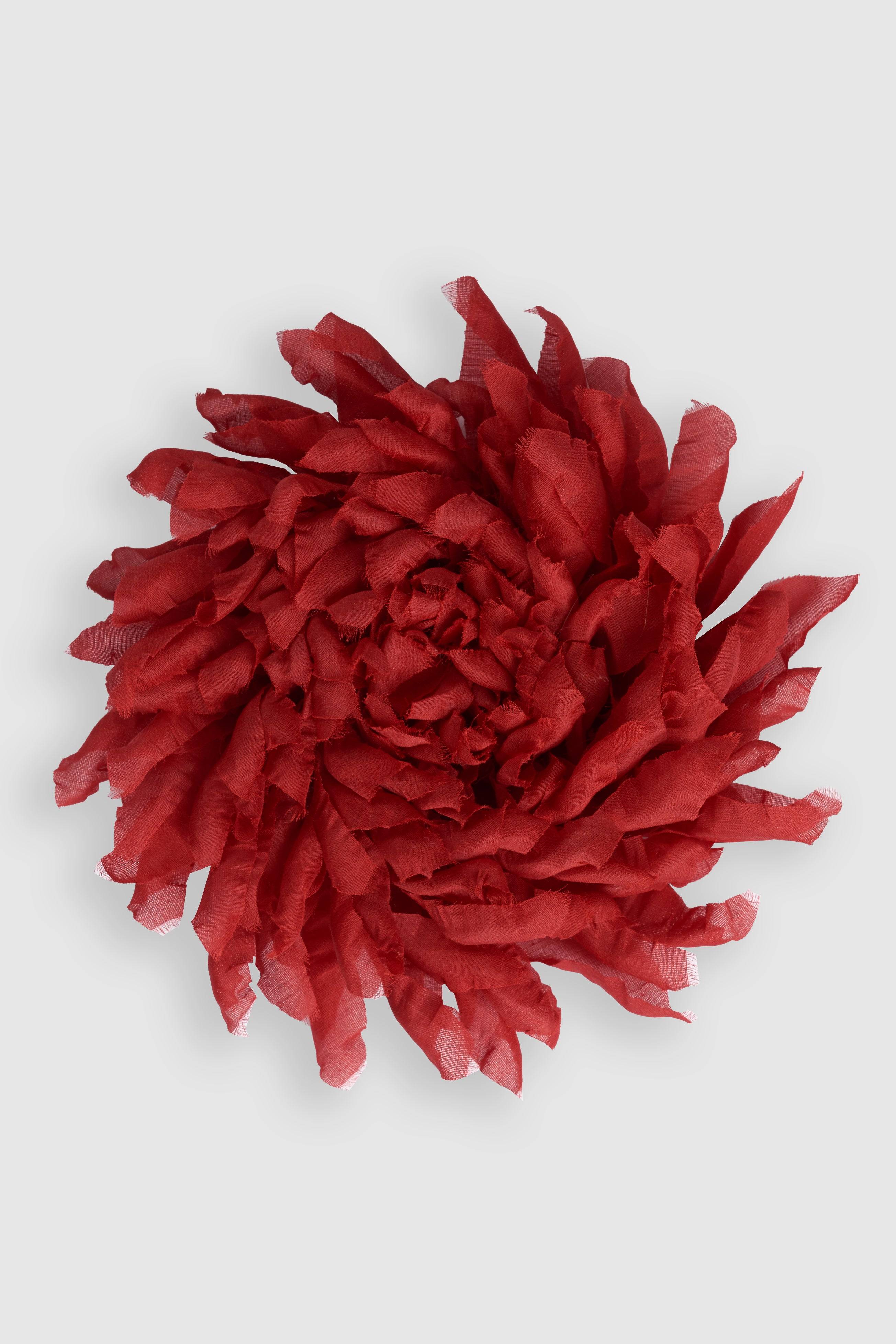 Red silk flower brooch handcrafted with delicate petals, a bold fashion accessory for elegant styling. Perfect for lapels, dresses, or hats.