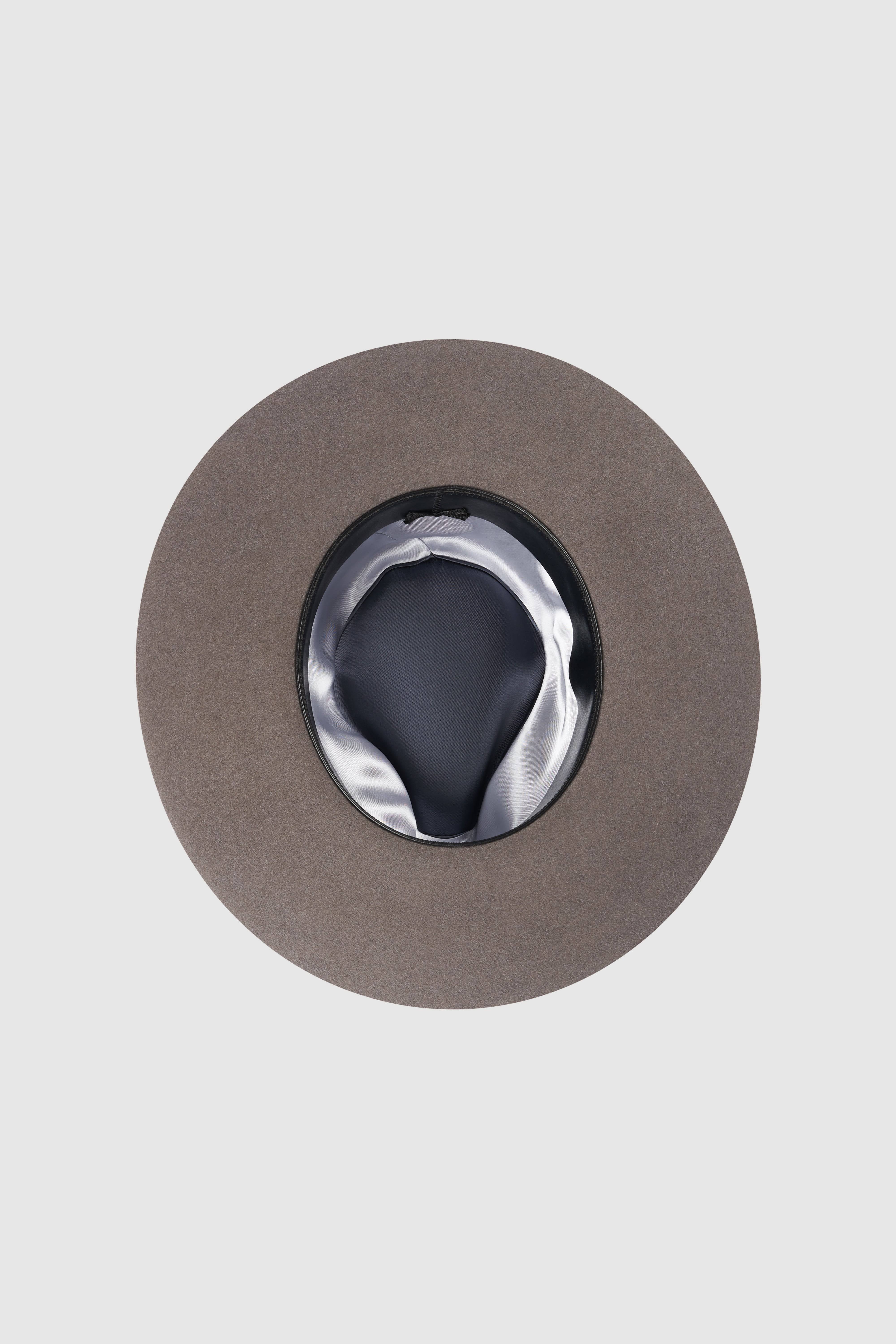 Interior view of the Monogram grey fedora hat, showcasing satin lining and premium craftsmanship. A luxury accessory for timeless elegance. Shop now.