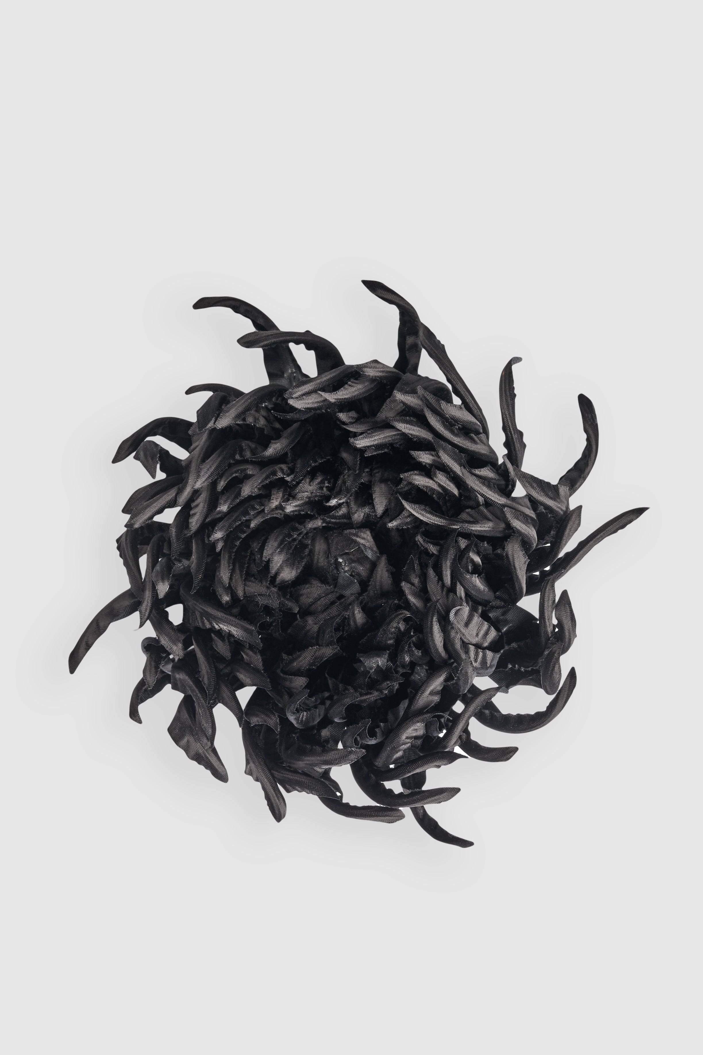 Elegant black silk chrysanthemum flower brooch with intricate handcrafted petals, perfect for couture styling. Shop now and save up to 10%.