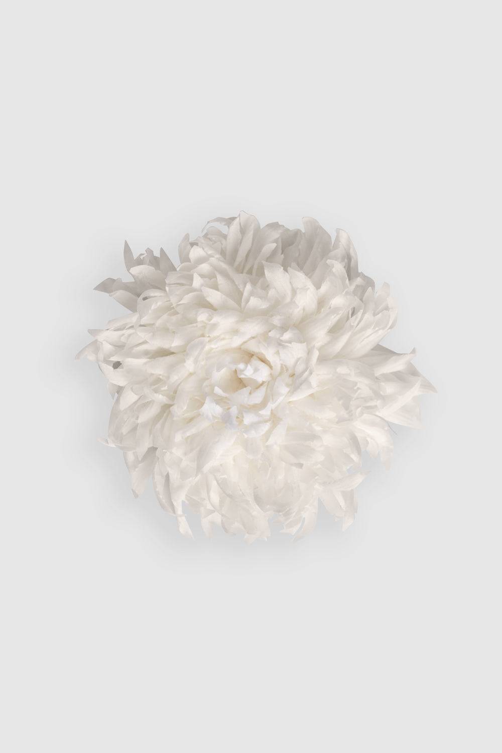 Elegant handcrafted white silk chrysanthemum flower brooch, perfect for elevating any outfit. Shop online and save 10% on this chic floral accessory.