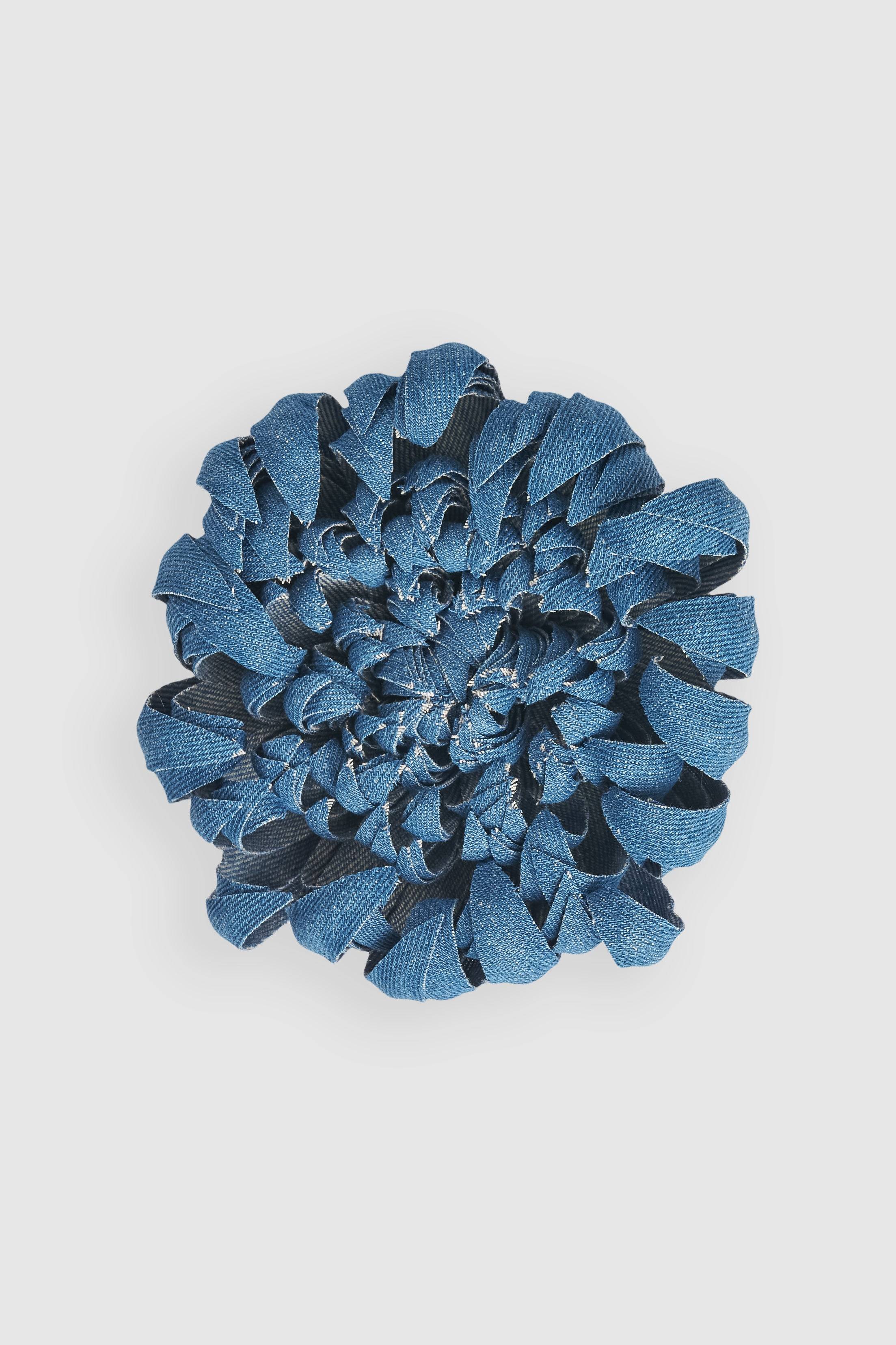 Borisetti Denim Flower Brooch handcrafted with layered blue denim petals in a chrysanthemum design. A chic statement accessory for any outfit.