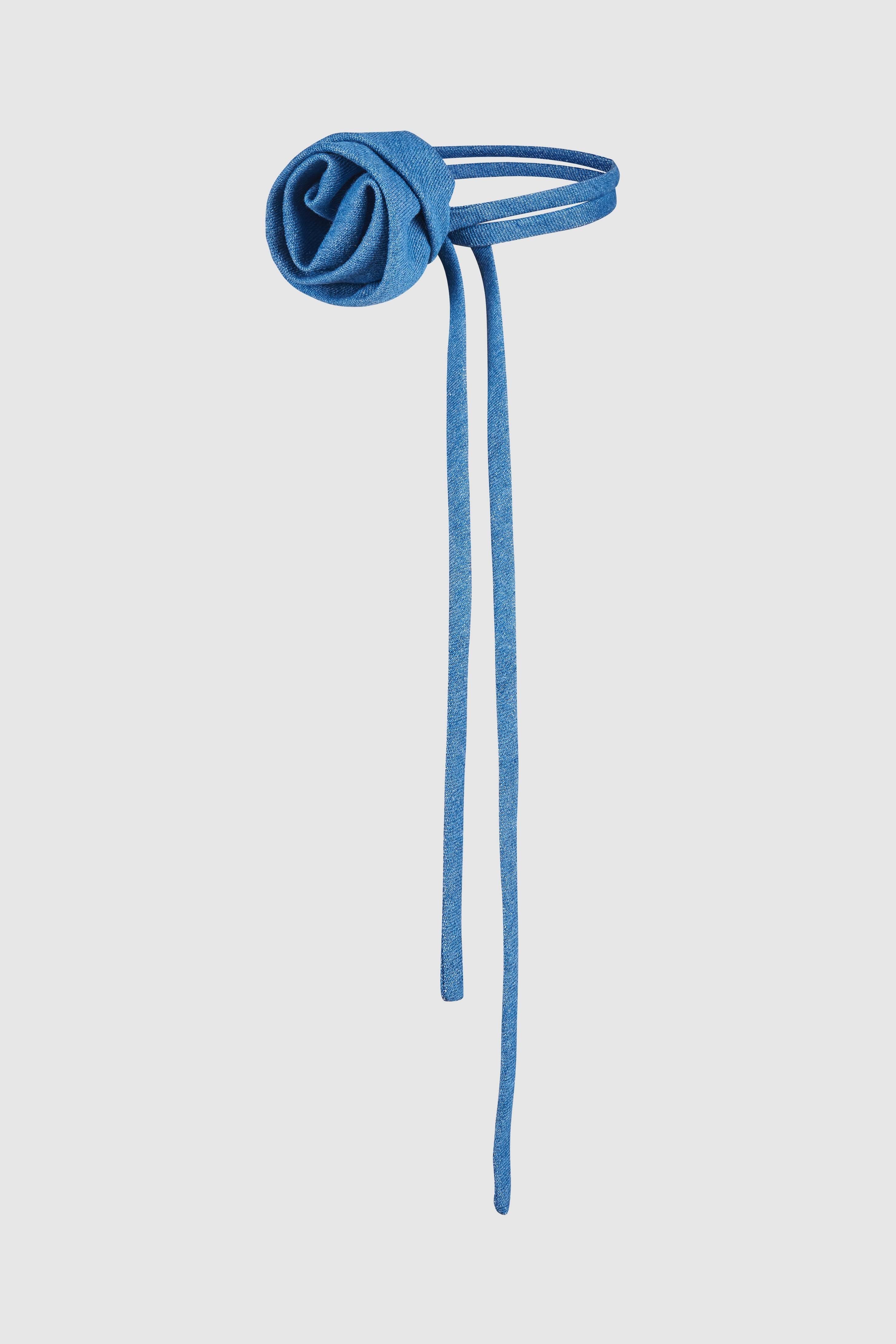 Denim Rose Flower Choker featuring a handcrafted denim rose on an adjustable choker. A stylish statement necklace perfect for special occasions.