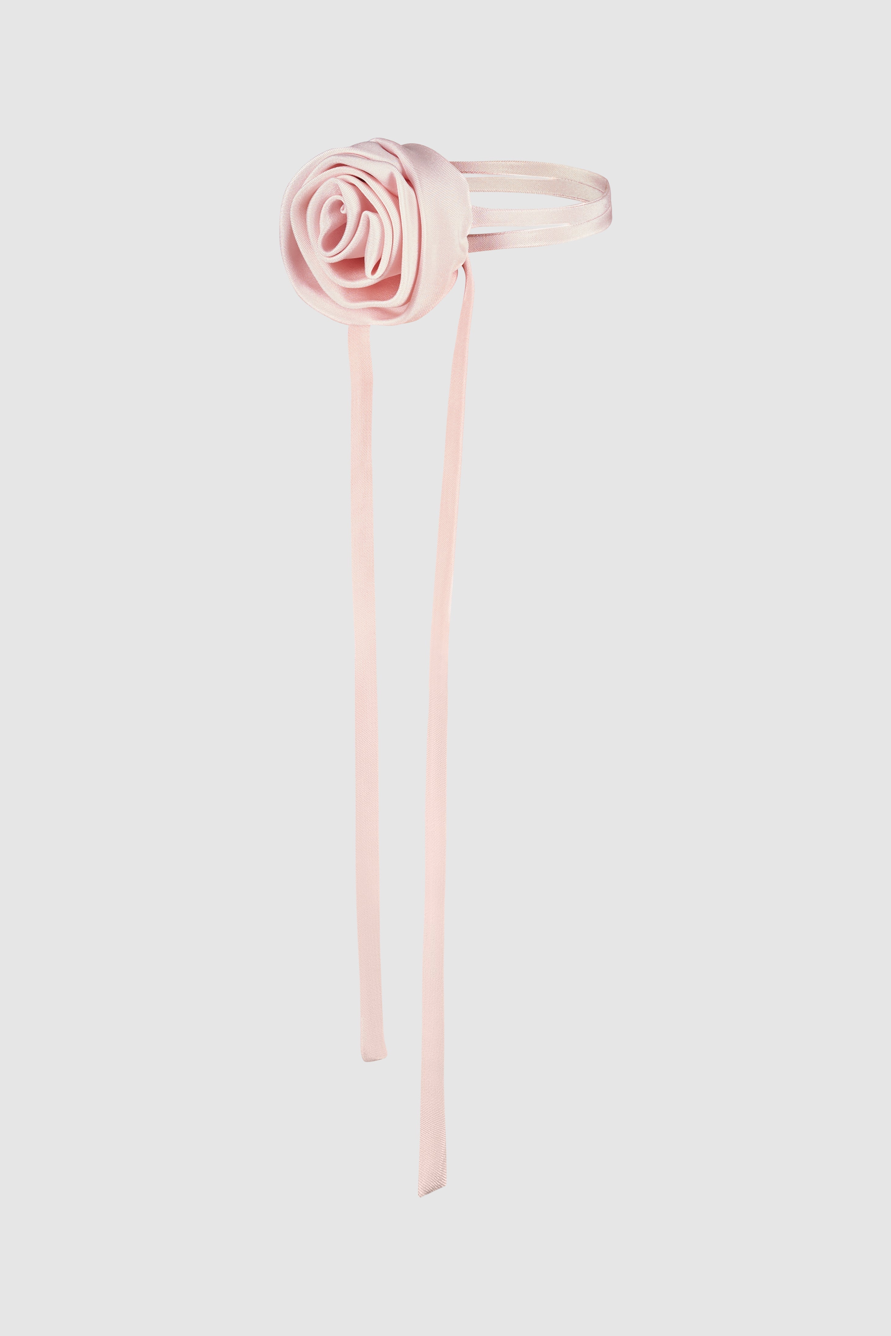 Elegant handcrafted light pink rose choker with silk ribbon ties. A luxurious floral necklace, perfect for romantic and couture styling.