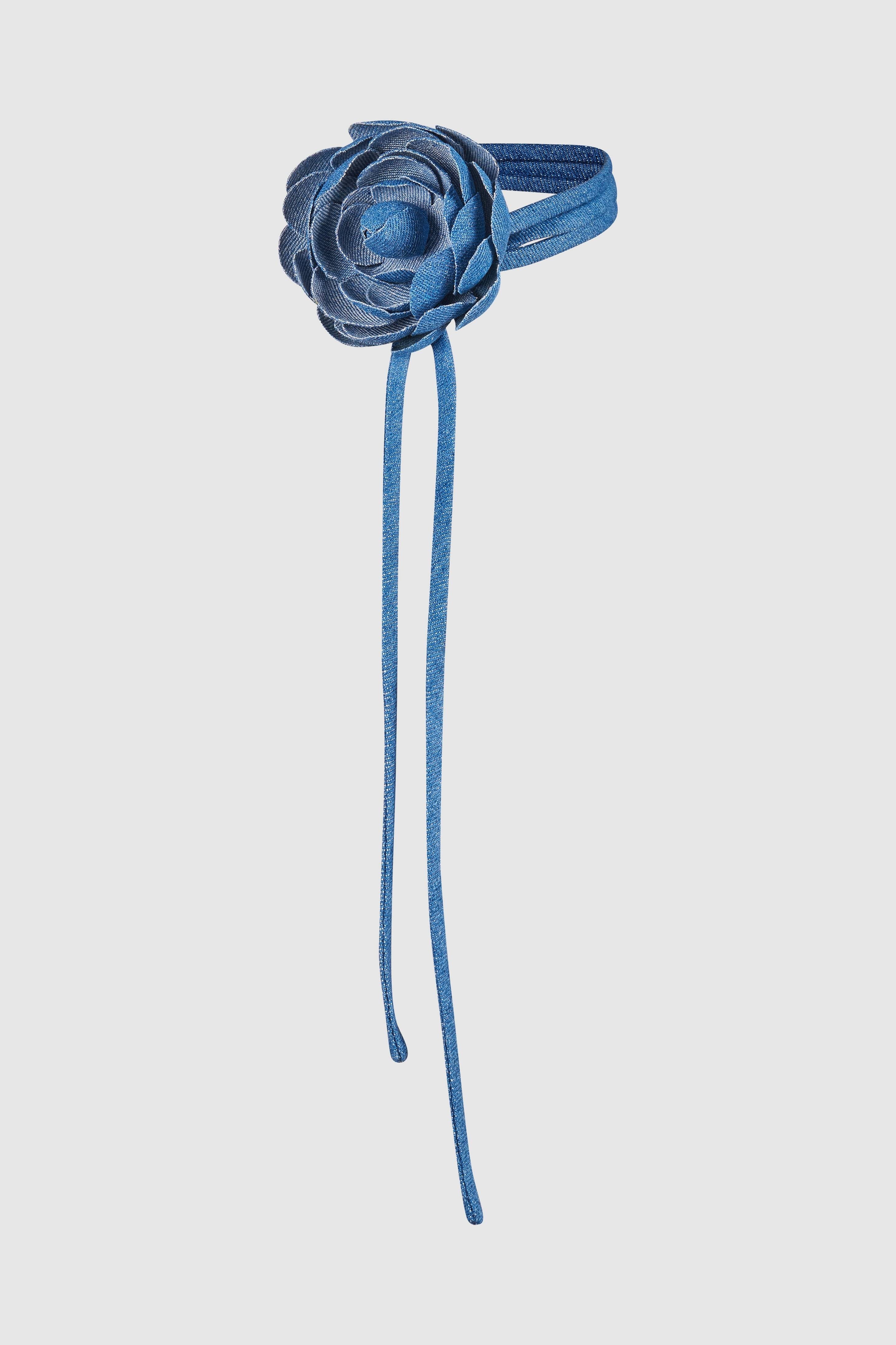 Denim Camellia Flower Choker featuring a handcrafted blue denim camellia design with adjustable ties. A statement accessory for elegant styling.