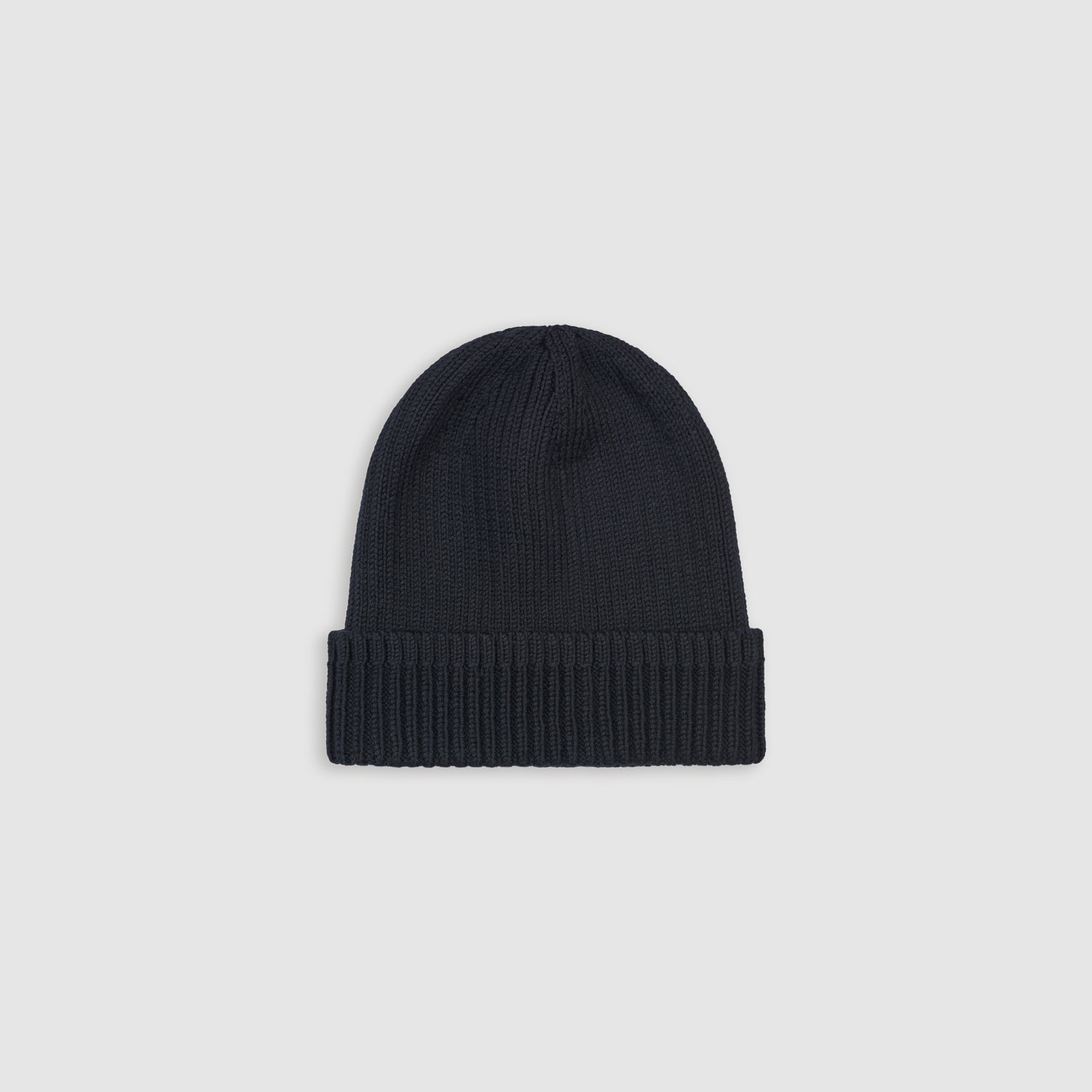 Merino wool beanie in black with a folded cuff, offering warmth and breathability. Handmade for a soft, cozy fit, perfect for winter wear.