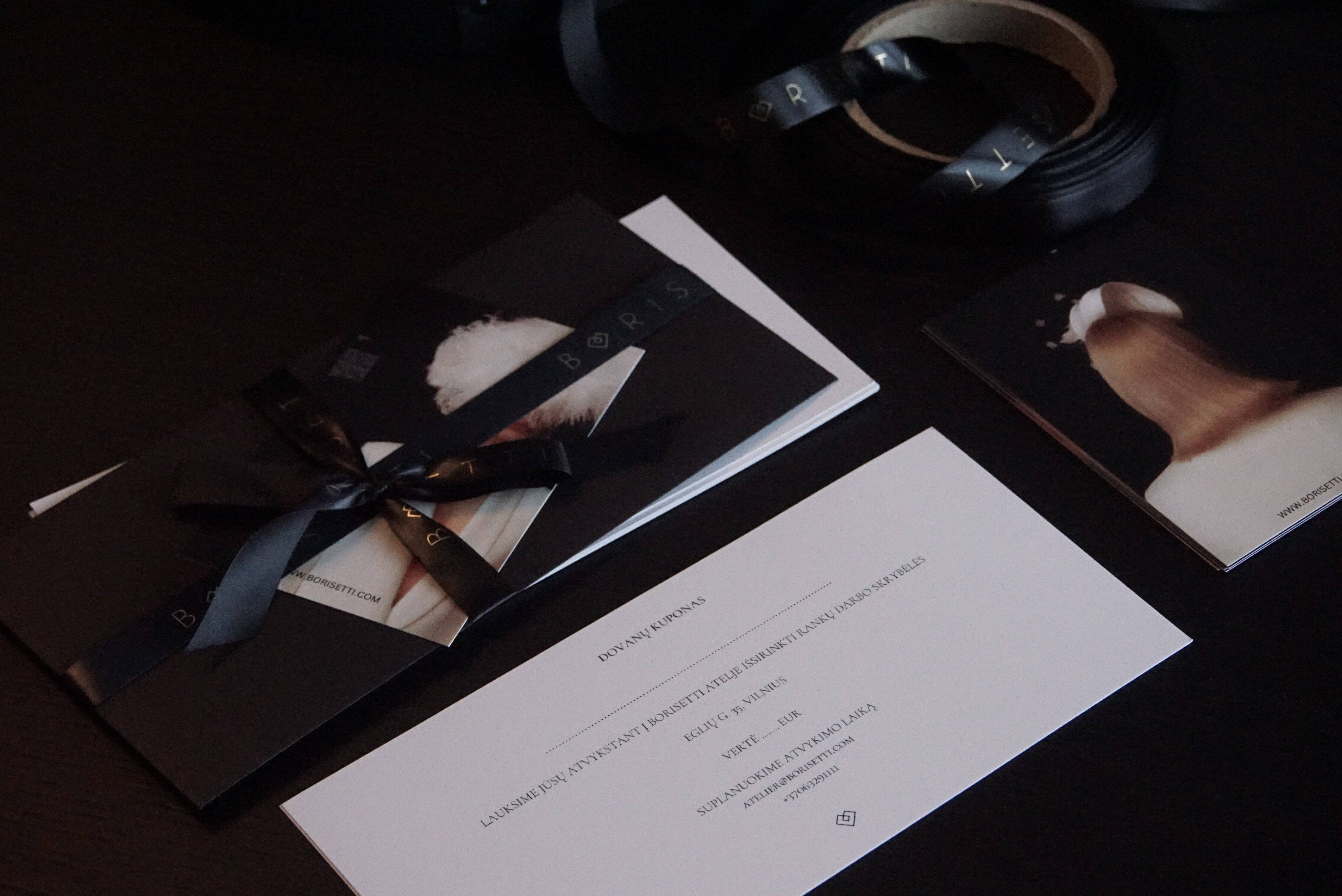 Borisetti Gift Card set with a black ribbon, luxury envelope, and artistic branding elements. Ideal for a sophisticated and thoughtful gift.