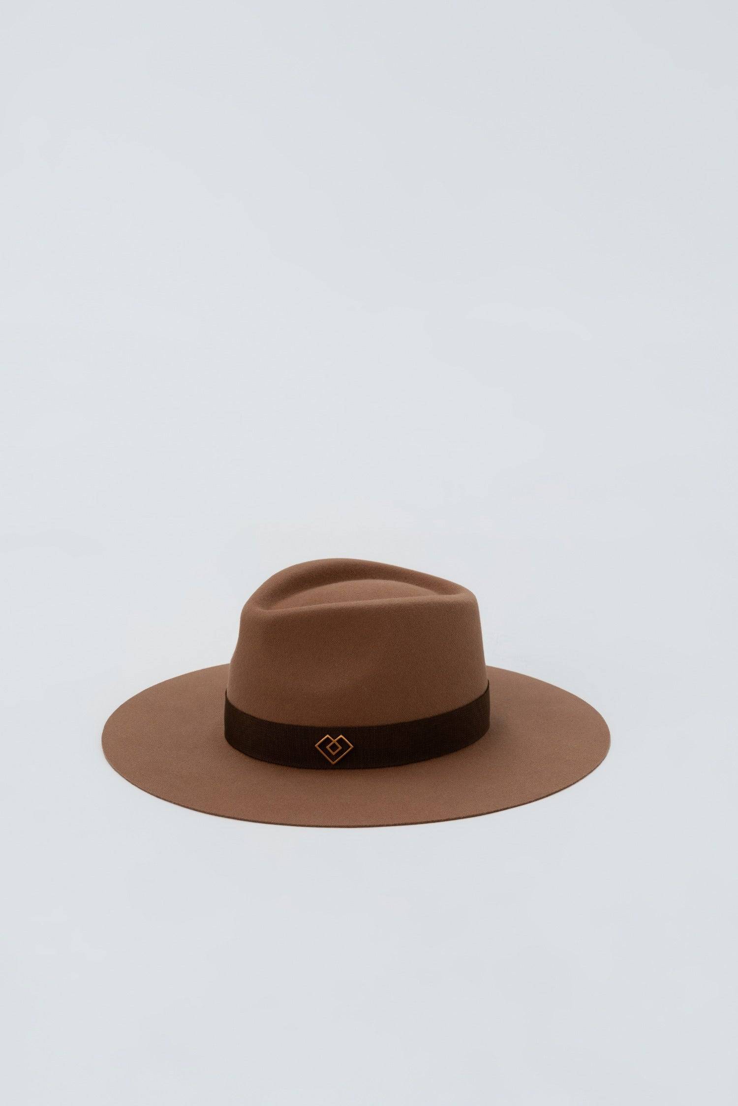 Monogram embellished brown fedora hat with a wide-brim and gold-plated accent on the band. A timeless and elegant handcrafted fashion statement.