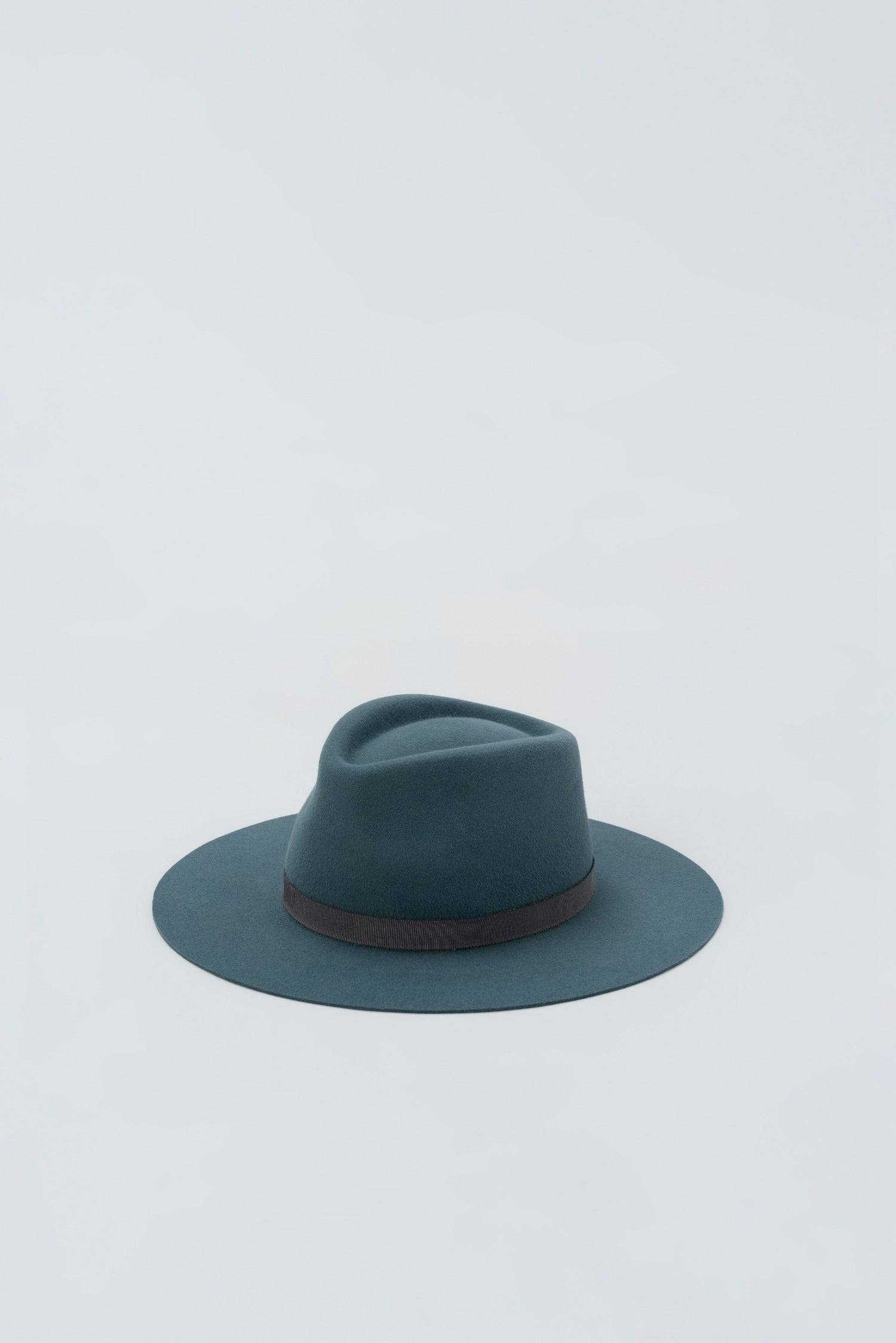 Teal fedora hat made from premium rabbit fur felt with a sleek brown band. A classic and elegant accessory for any wardrobe.
