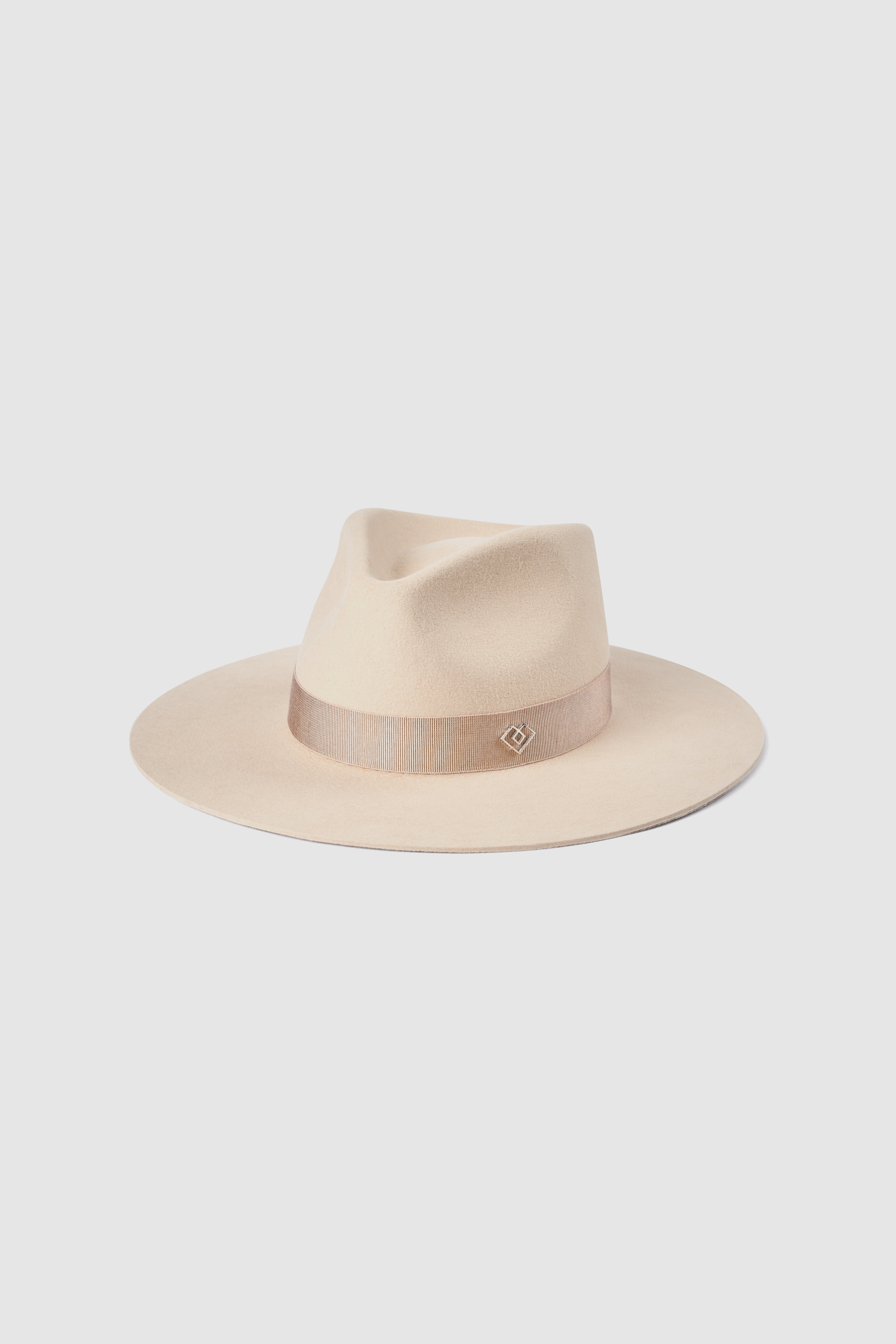 Close-up of a cream fedora hat with a wide brim and elegant ribbon detail. Shop this classic Borisetti Fedora for a sophisticated and timeless style.